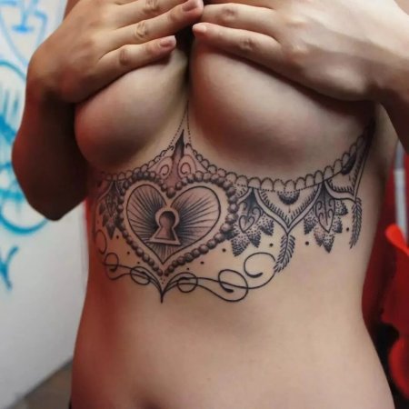 Тату под большими сиськами